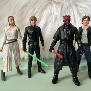 Four Star Wars toy figures